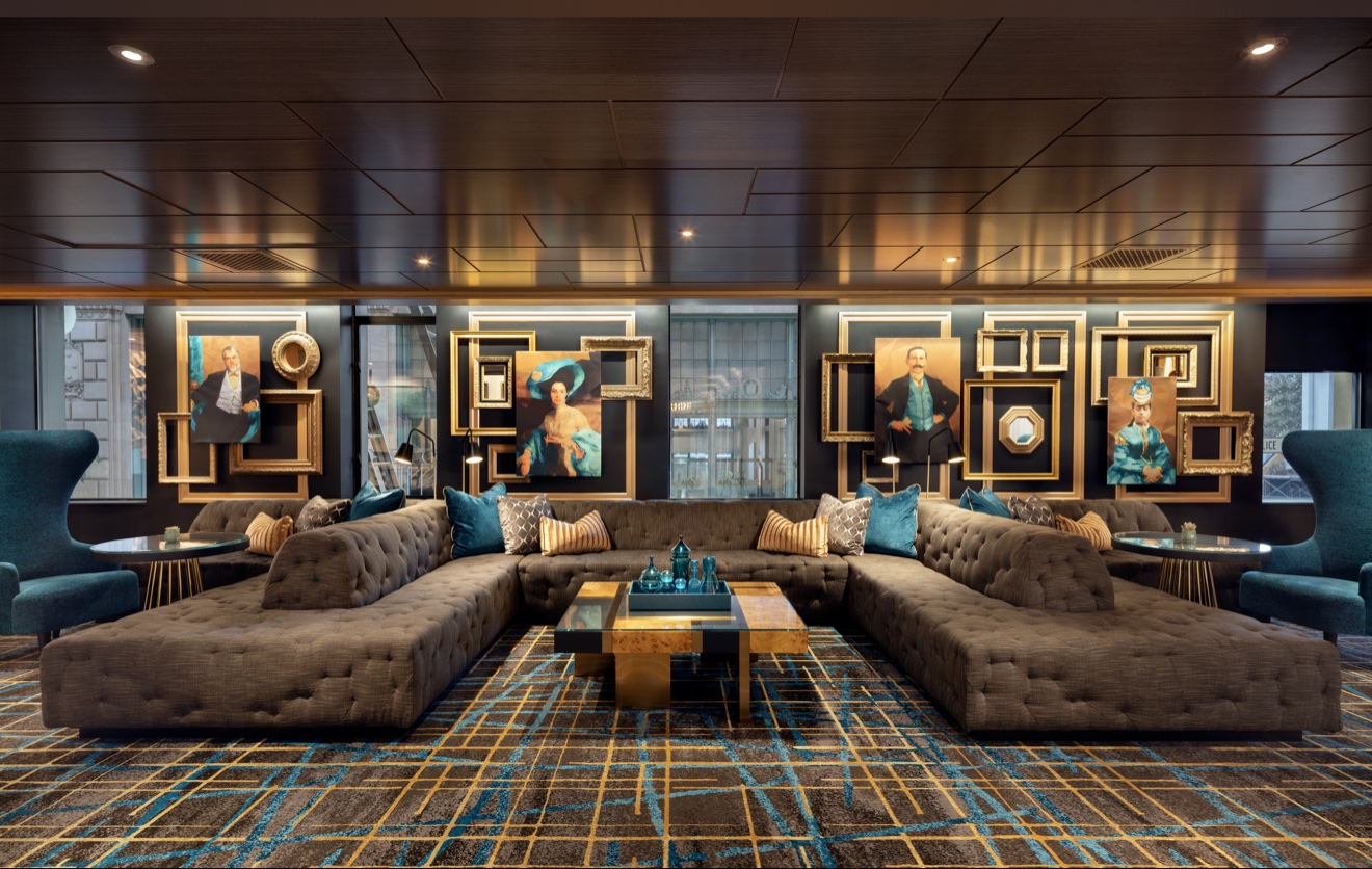 Refined Courtyard Marriott San Francisco lounge with tailored seating and framed artwork