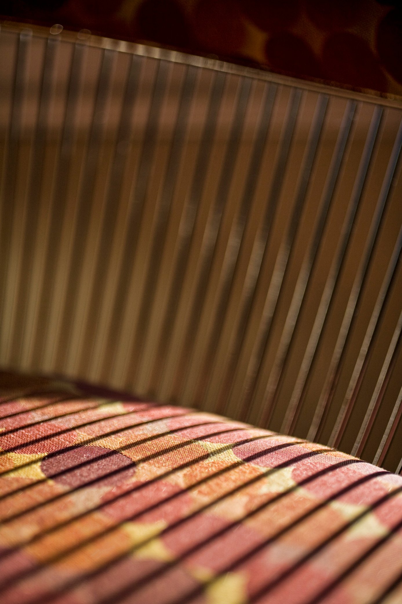 Green Street B Residence detail of patterned textiles and wood paneling