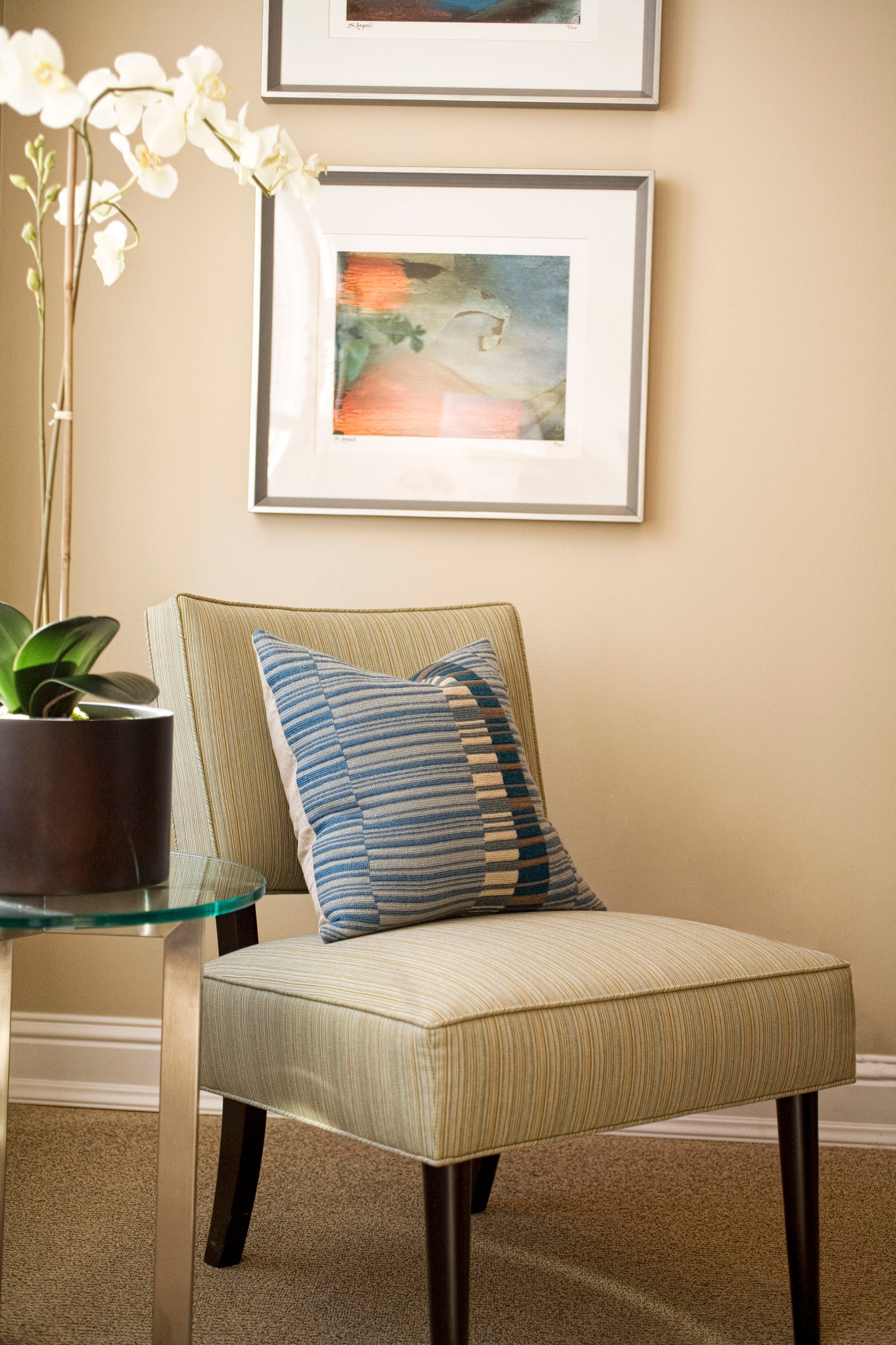 Green Street C Residence upholstered armchair with blue pillow