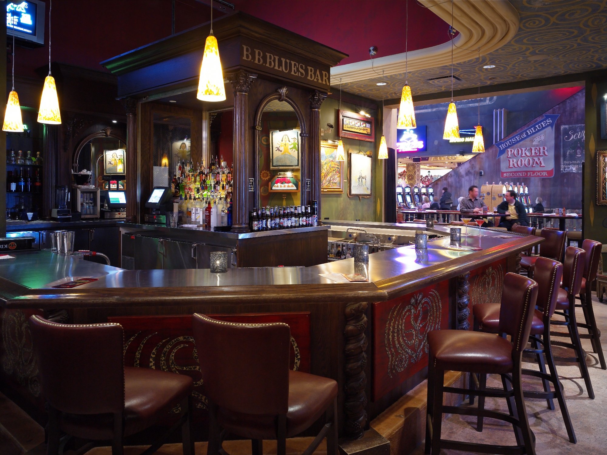 B.B. Blues Bar with carved woodwork and amber pendant lights