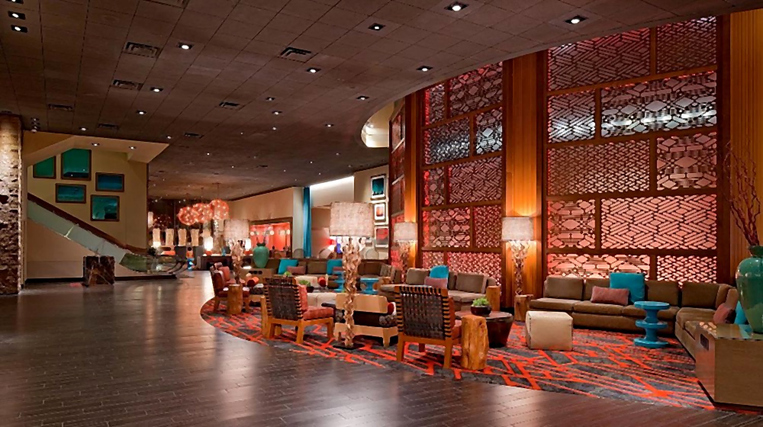 Hyatt Hotel lobby with colorful lounge seating and patterned architectural screens