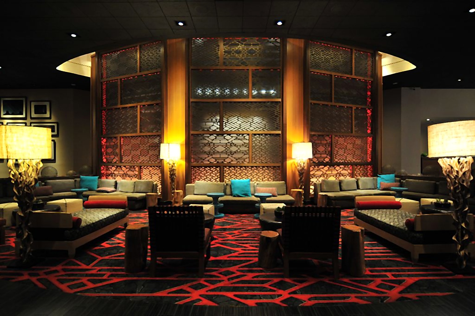 Hyatt Hotel seating area framed by glowing columns and patterned screens