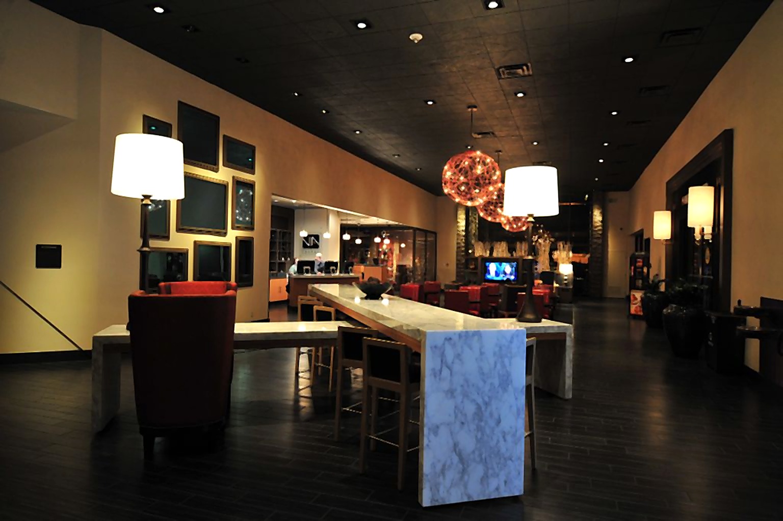 Hyatt Hotel communal workspace with marble counter and framed artwork