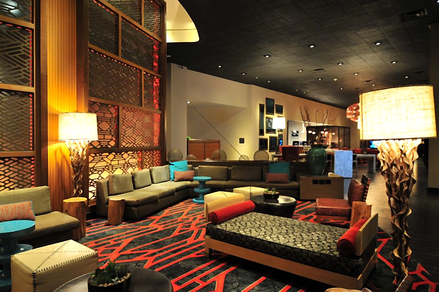 Hyatt Hotel conversation lounge with sofas and patterned screens