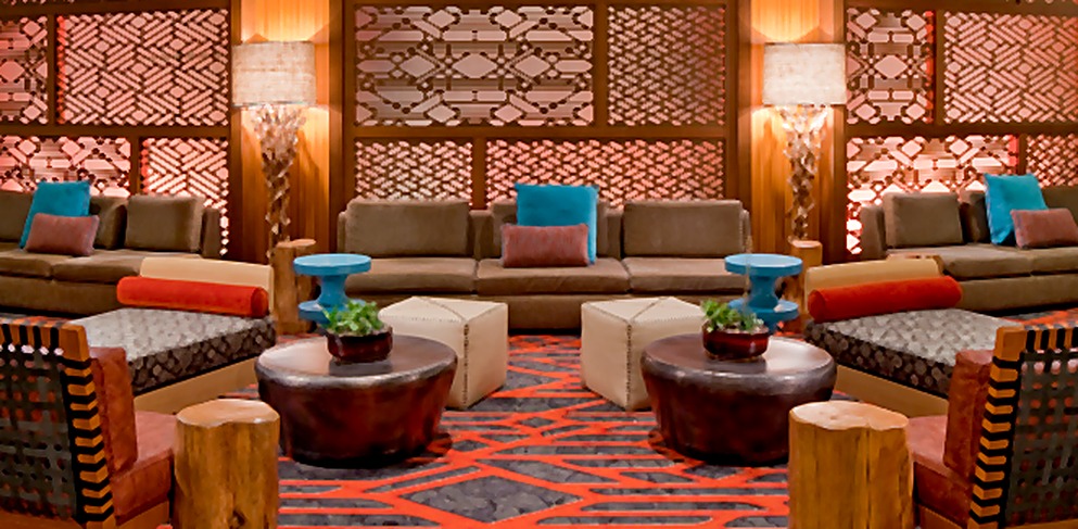 Hyatt Hotel seating group with turquoise accents and patterned architectural screens