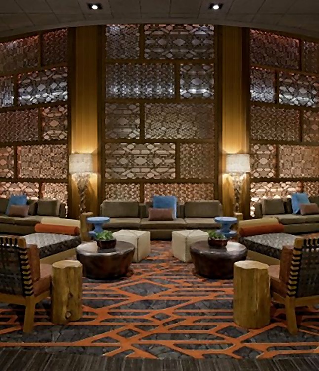Hyatt Hotel lobby lounge with patterned screens and a central glowing column