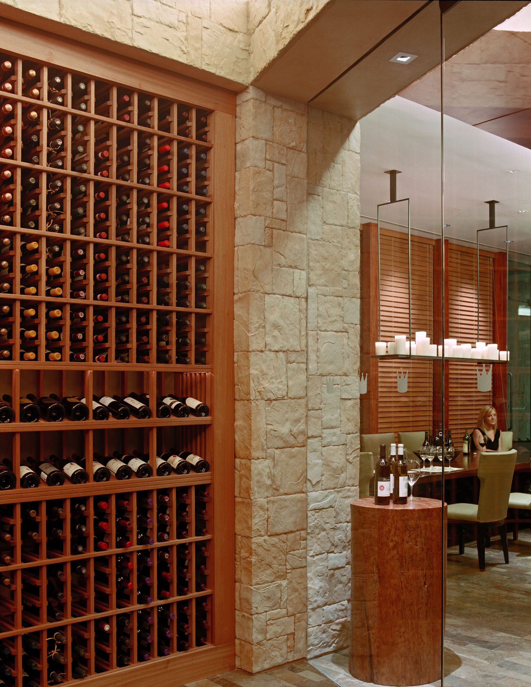 Le Chateau wine wall leading into an intimate tasting room
