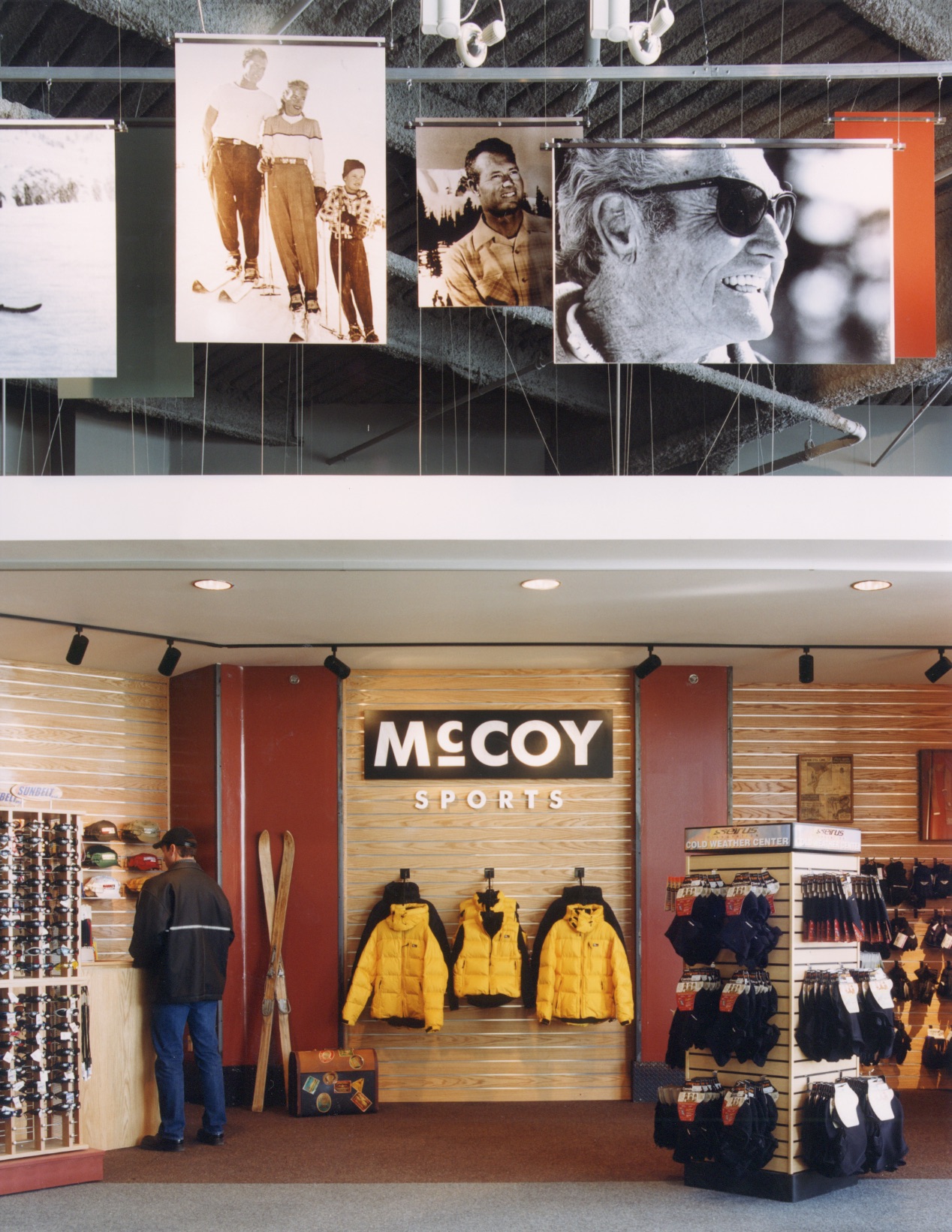 McCoy Sports shop with ski apparel and suspended historic photographs