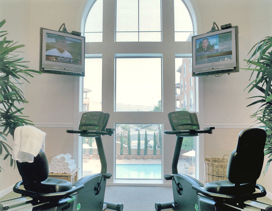 Spa at the Palazzo fitness room with exercise bikes overlooking the pool