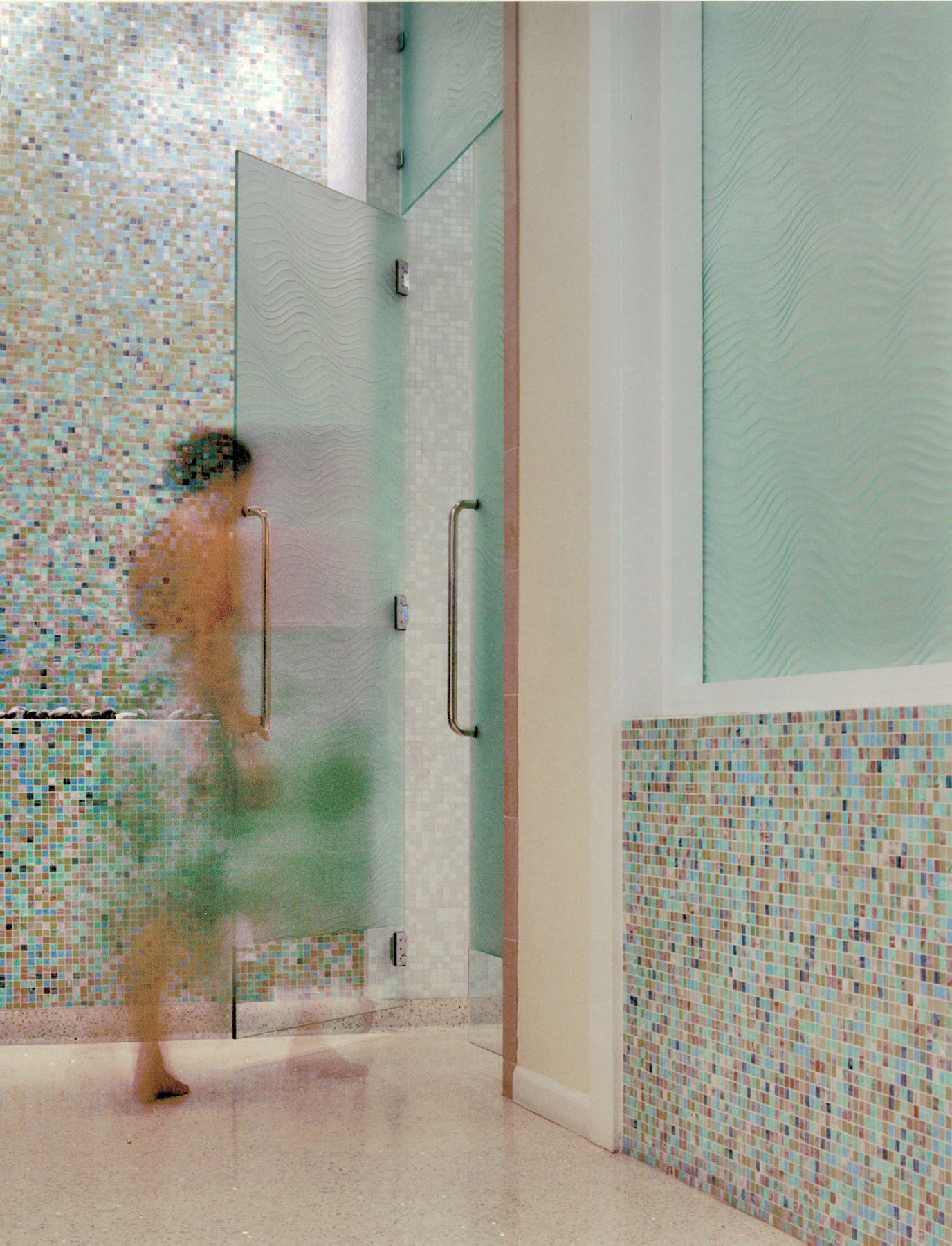 Spa at the Palazzo steam room with frosted glass and pastel mosaic tile