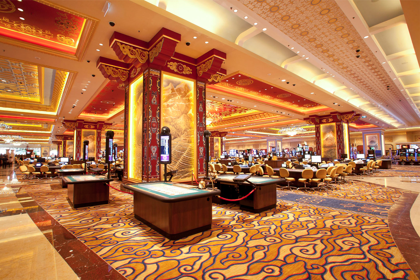 Sands Cotai Central casino floor with red-and-gold columns and patterned carpet