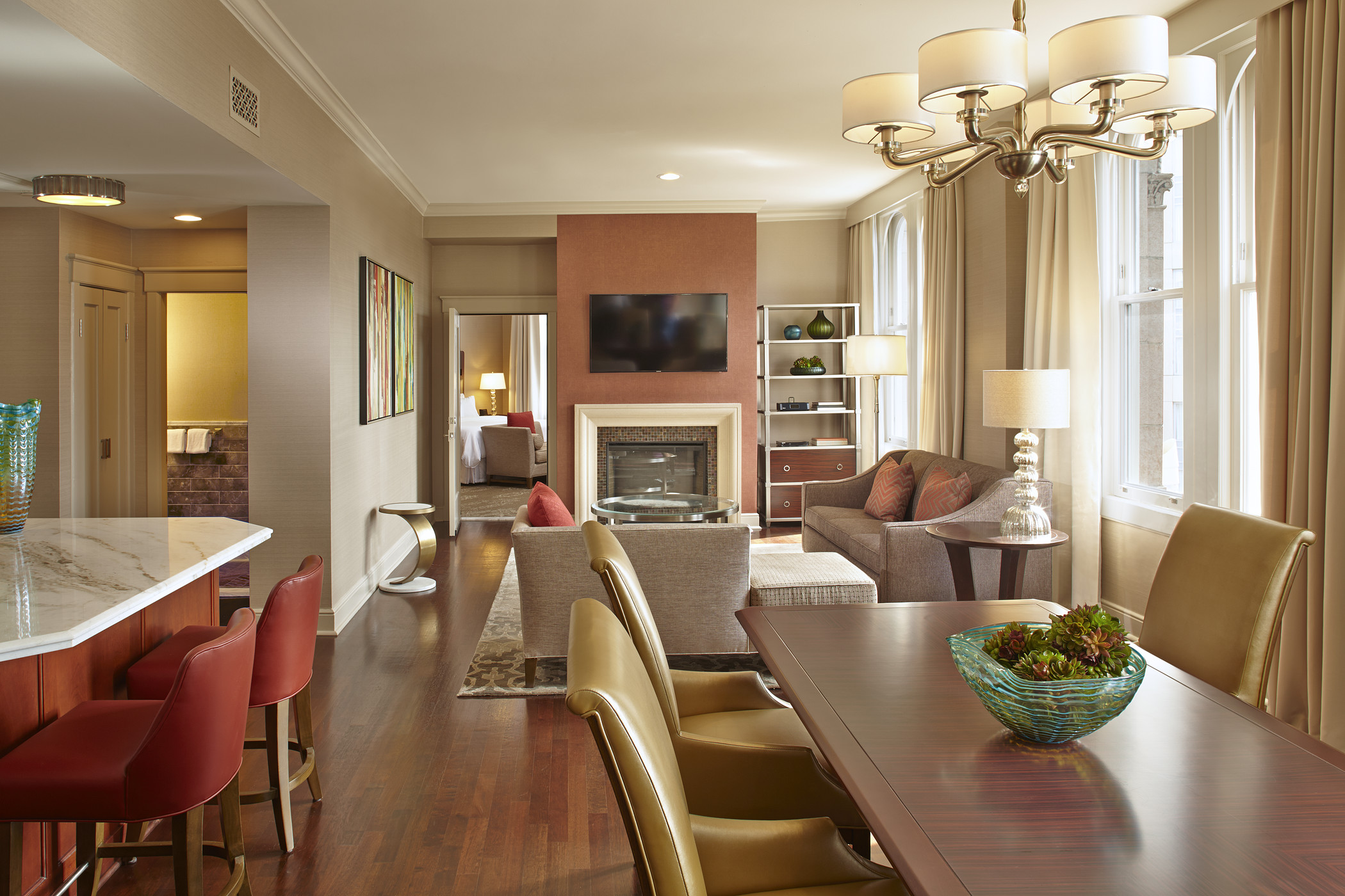 The Westin St Claire suite living room with fireplace and dining area
