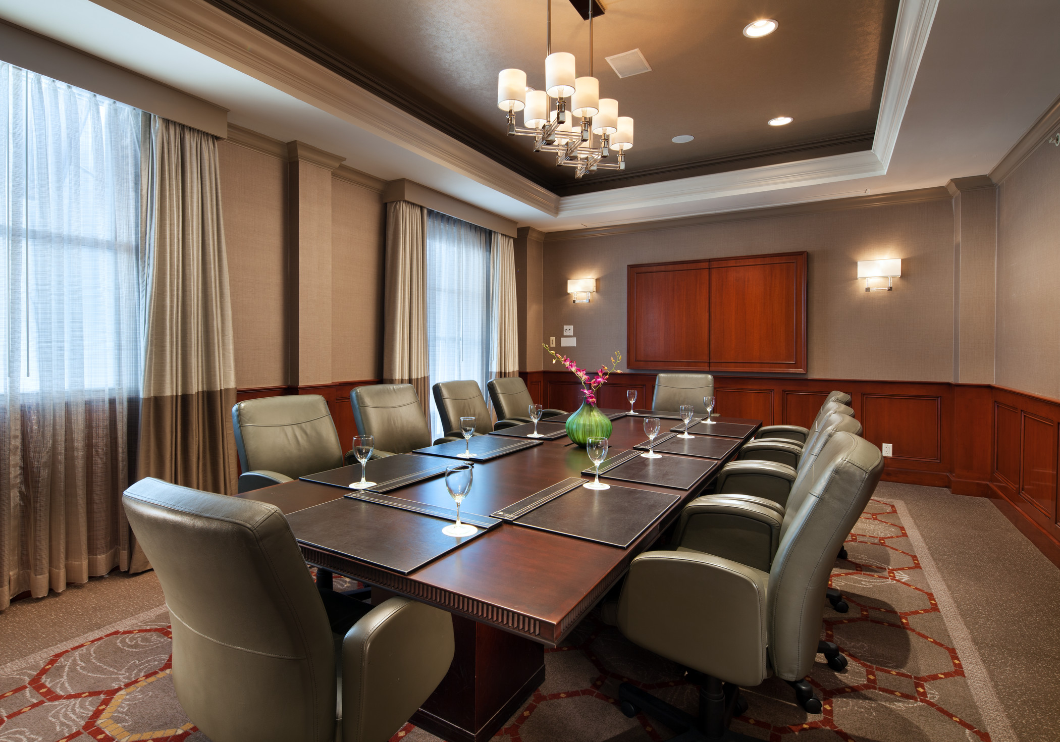 The Westin St Claire boardroom with paneled walls and chandelier lighting