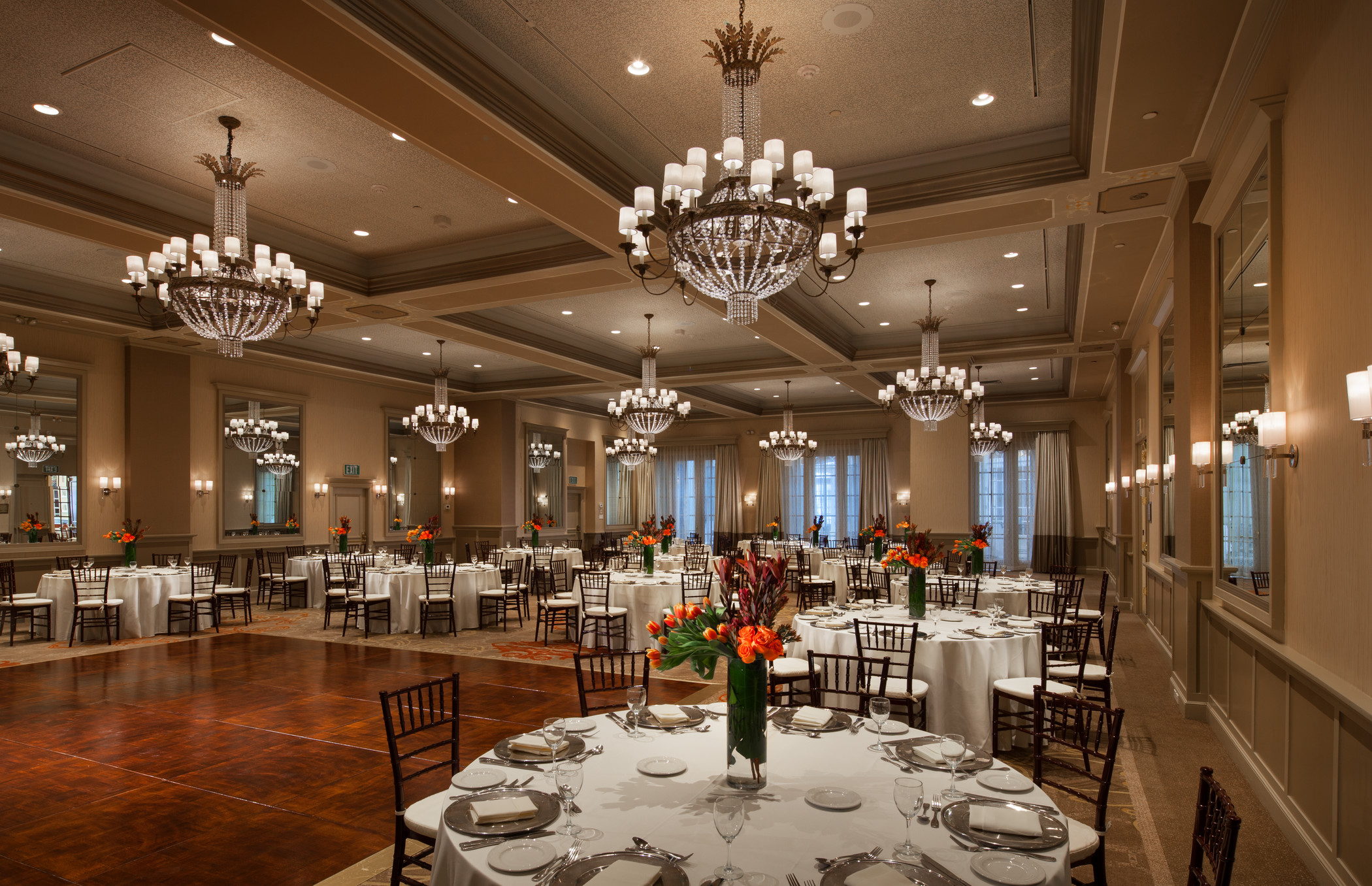The Westin St Claire ballroom with crystal chandeliers and dining tables