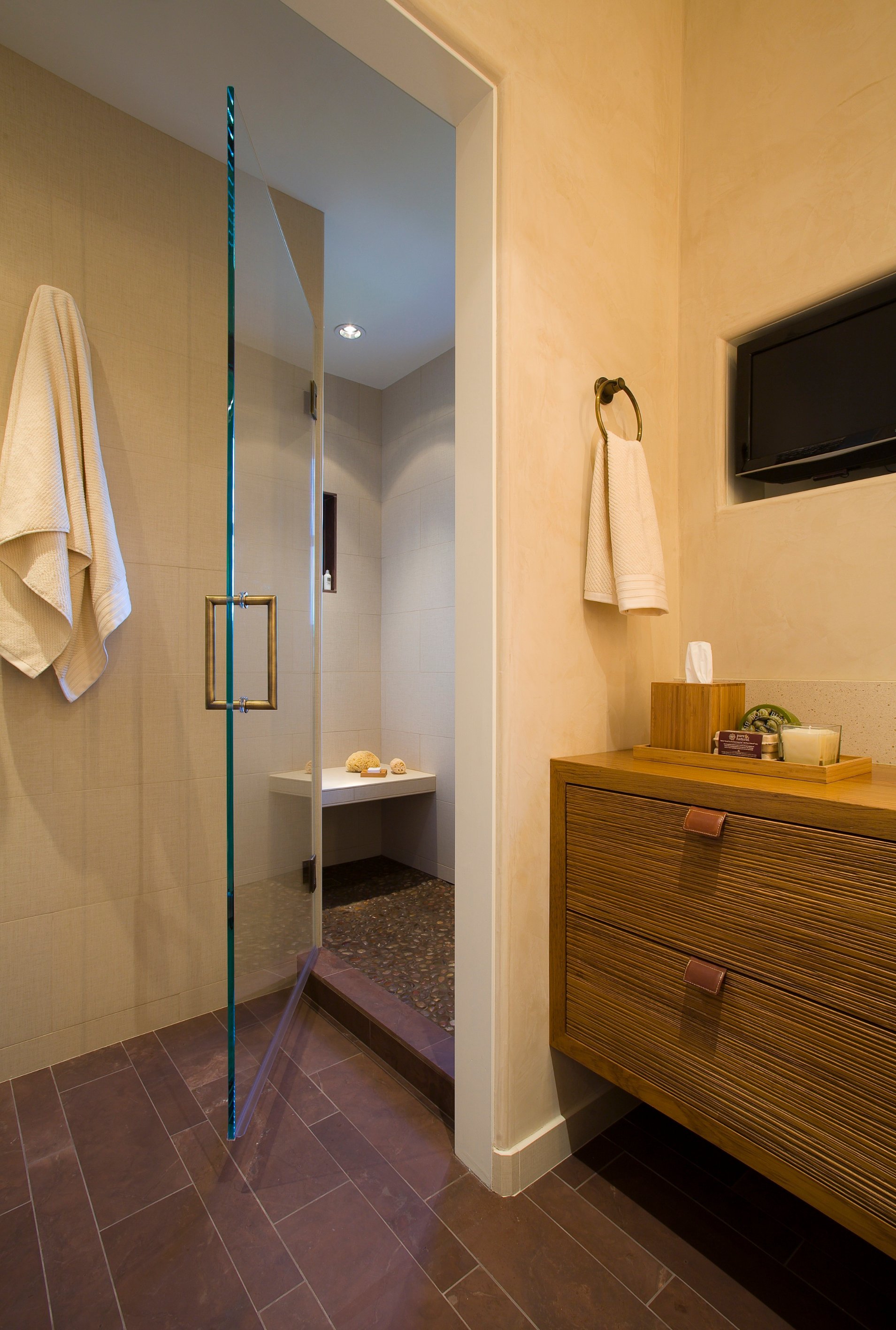 Garwood Residence bathroom with a freestanding tub and wood vanity